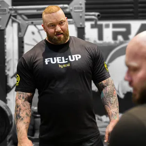 Hafþór Júlíus Björnsson, also known as The Mountain from Game of Thrones, working out in the gym dressed in a Fuel-Up by Kcal t-shirt.