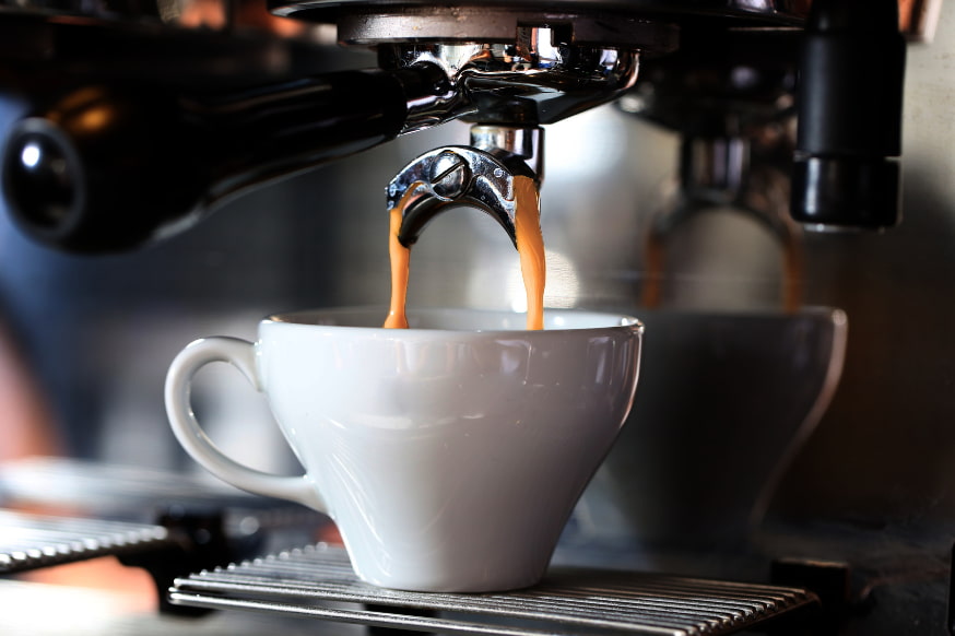 Espresso machine making a black coffee